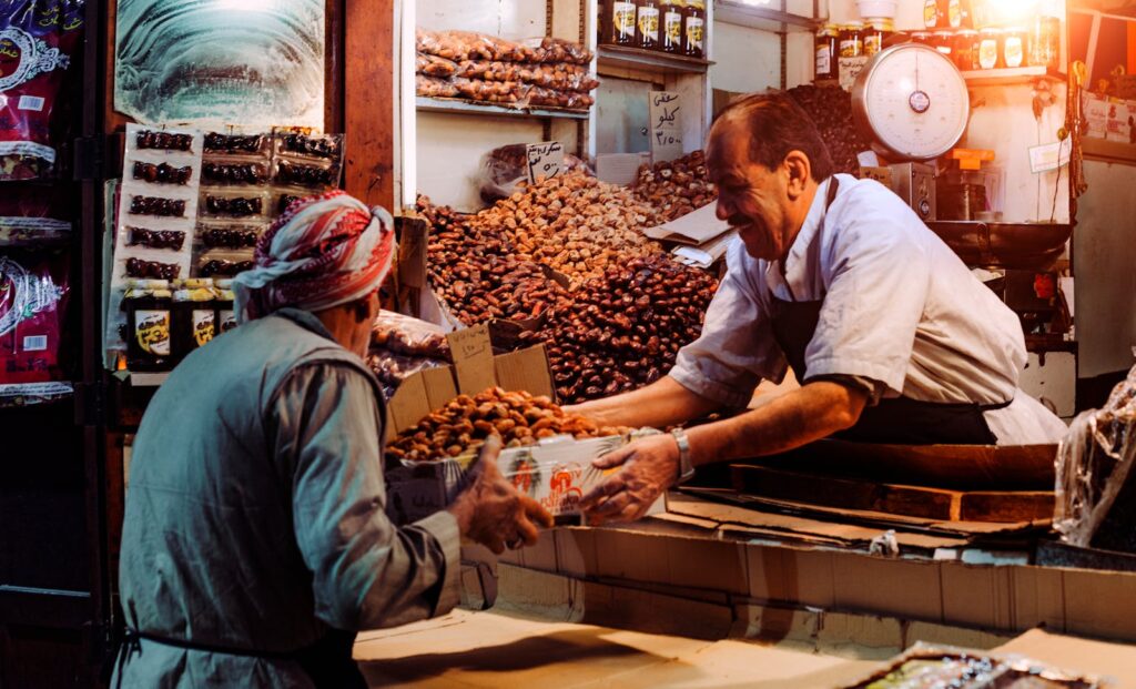 small business tools header image of two men at a street cart